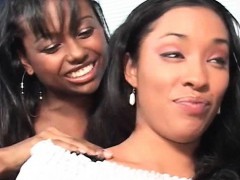 Sensual ebonies kissing and sucking big boobs