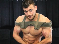 Huge oiled up bodybuilder eats cum