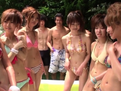 A bunch of Japanese bikini babes have a wrestling match!