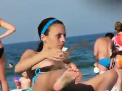 Topless Beach Babe Rubbing Lotion On Her Body